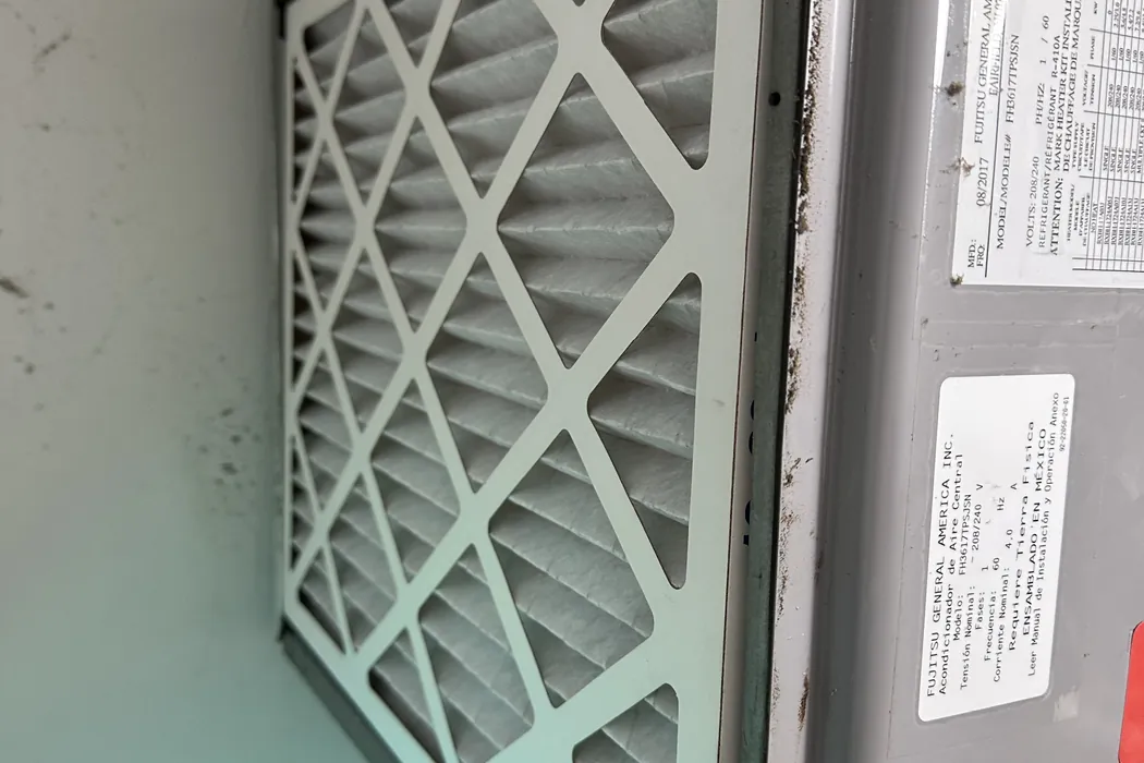 Clean filter installed in an air handler filter slot