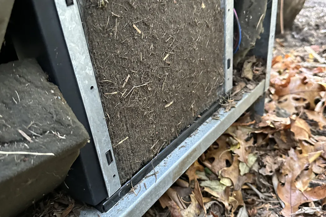 Dust-loaded filter still sitting in its rack