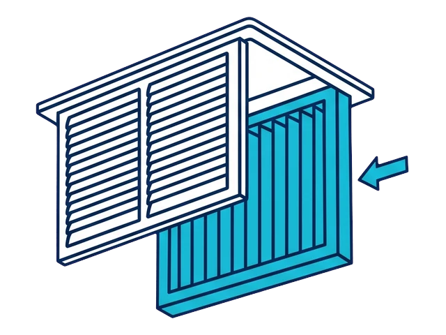 Clean pleated filter sliding into its slot with the airflow arrow